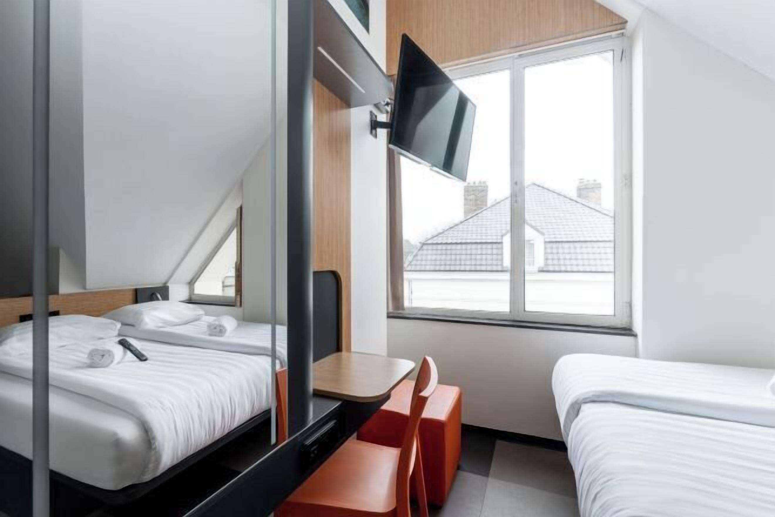 Laptop workspace, iron/ironing board, free WiFi, bed sheets