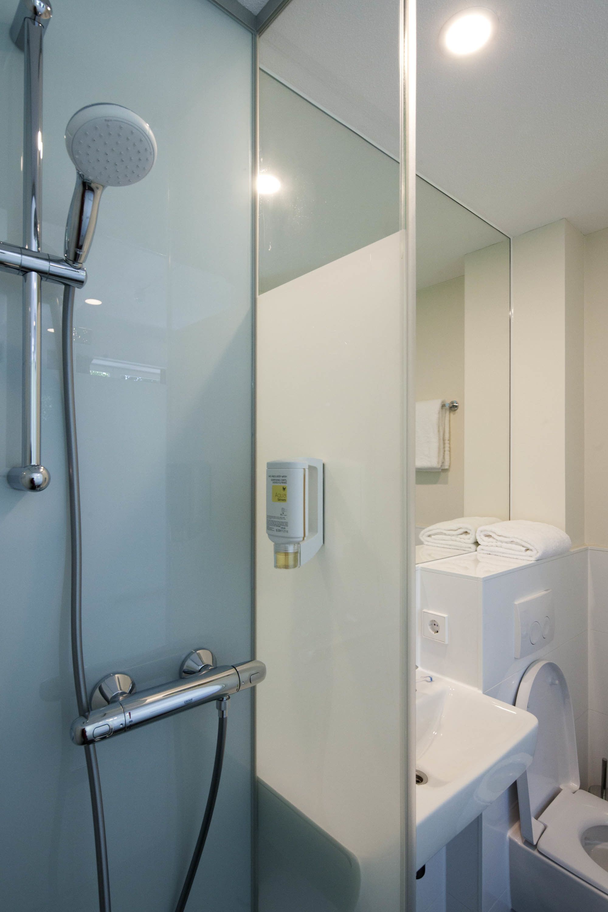 small double room, 1 queen bed | bathroom | shower, eco-friendly toiletries, hair dryer, towels