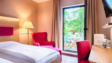 Doppelzimmer, mit Bad | Wohnbereich | Flachbildfernseher