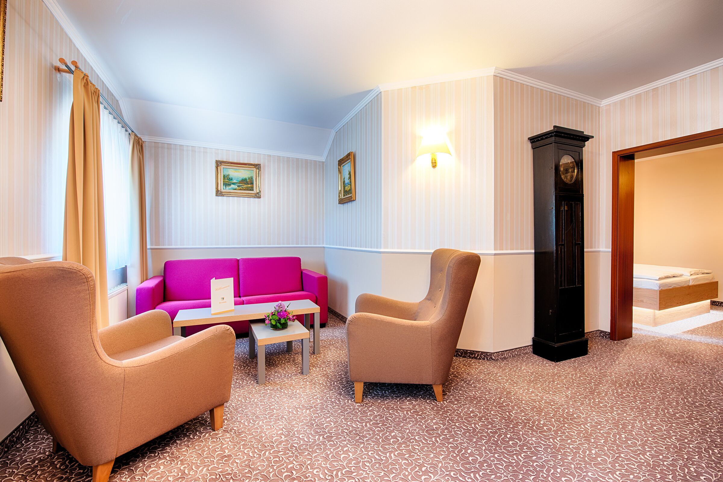 suite | living area | flat-screen tv