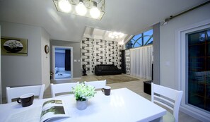 Condo (Bali) | Living area | Flat-screen TV