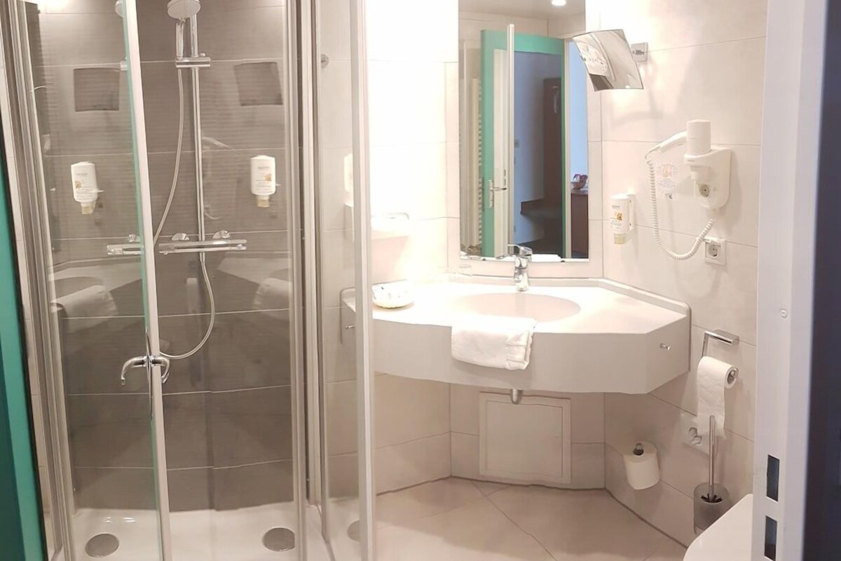 Bathroom | Shower, free toiletries, hair dryer, towels