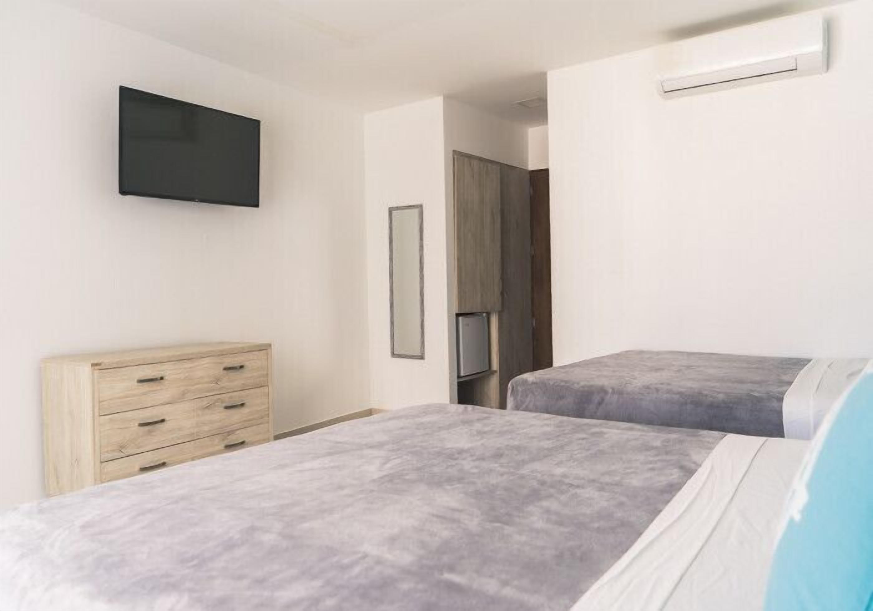 Premium bedding, free minibar items, in-room safe, soundproofing