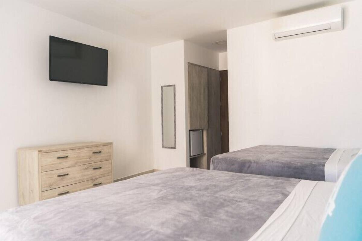 Premium bedding, free minibar items, in-room safe, soundproofing