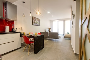 Flat-screen TV - Soul Hometown Apartments by Mikitito Rentals (Playa del Carmen)