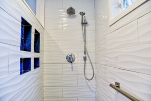 Combined shower/tub, hair dryer, towels, soap