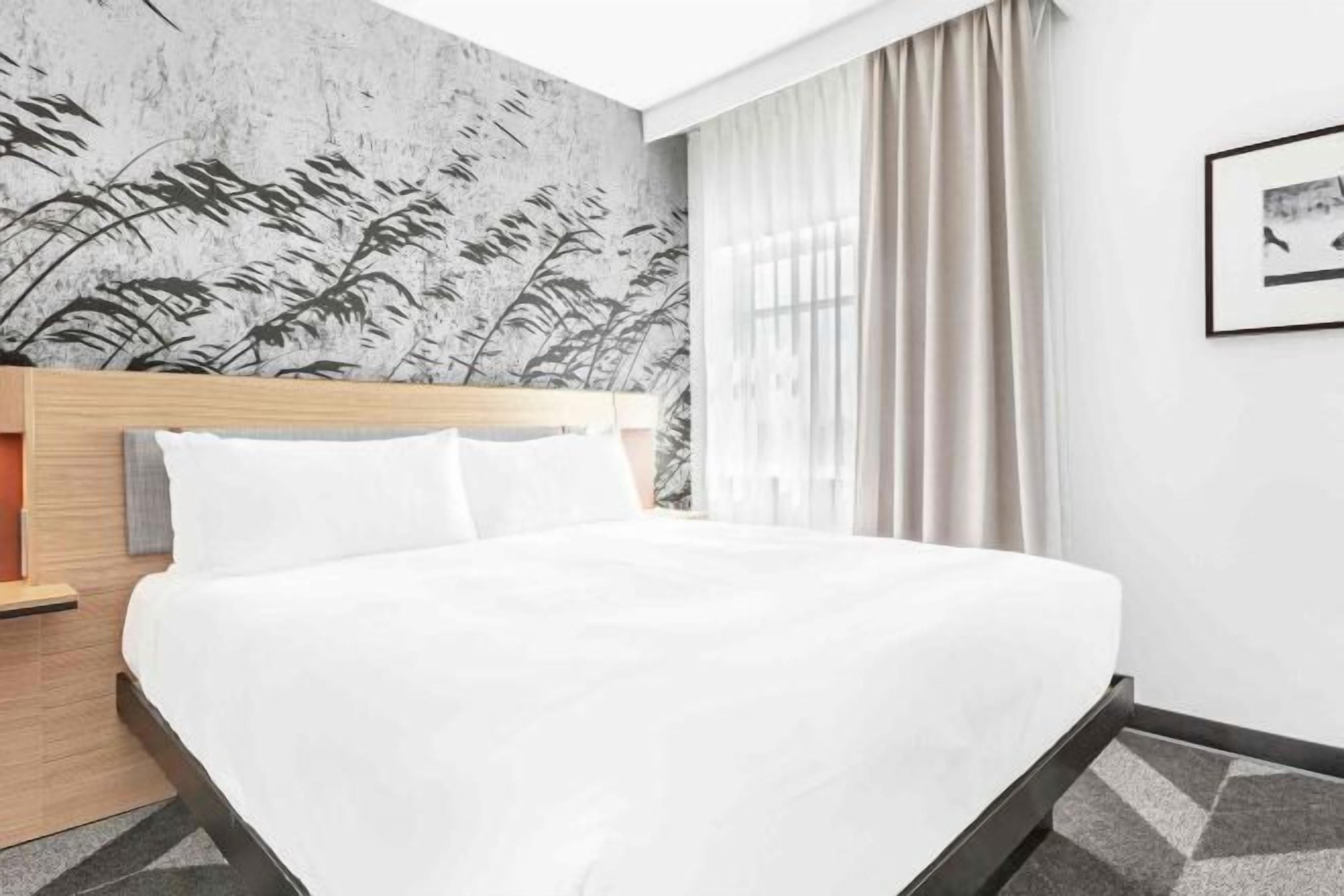 Premium bedding, down comforters, in-room safe, desk