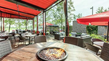 Breakfast, lunch, dinner served; French cuisine, golf course views