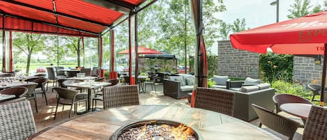 Breakfast, lunch, dinner served; French cuisine, golf course views
