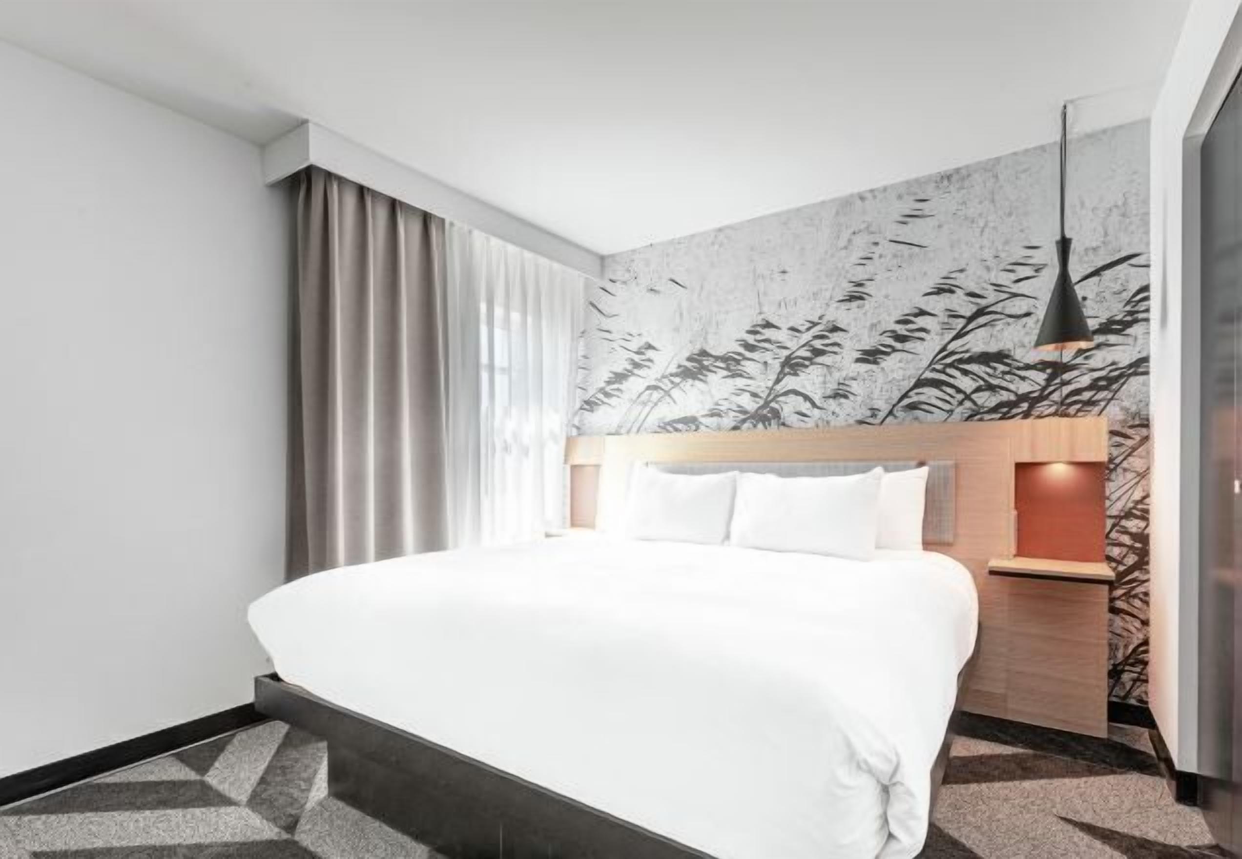 Premium bedding, down comforters, in-room safe, desk