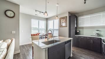 Deluxe Apartment, 2 Bedrooms | Private kitchen | Full-sized fridge, microwave, oven, stovetop