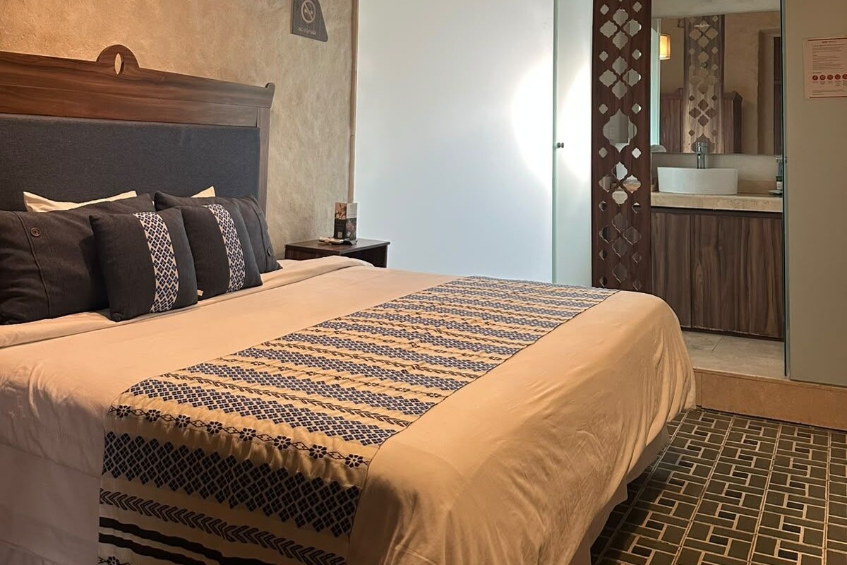 Basic Room | Down comforters, minibar, in-room safe, iron/ironing board (on request)