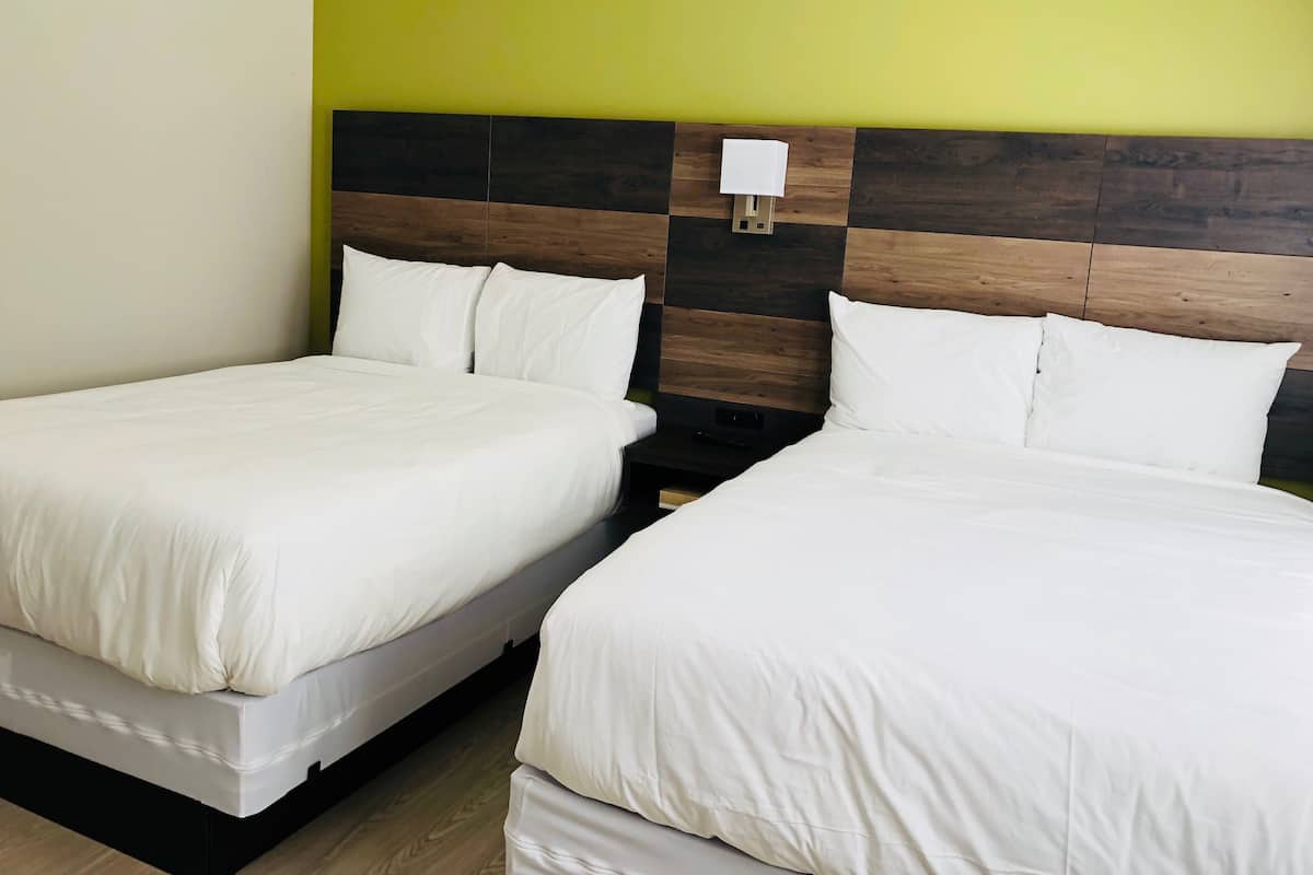 Standard Room, 2 Double Beds, Private Bathroom | Desk, blackout drapes, WiFi (free), bed sheets