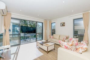 Basic House, 4 Bedrooms | Living area | Flat-screen TV - Hero Holiday House L12 (Auckland)