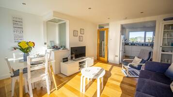 Smart TV, DVD player, books, video library