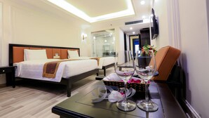 Deluxe Twin Room, Smoking | Minibar, in-room safe, desk, blackout drapes - New Era Hotel & Spa (Bai Chay)