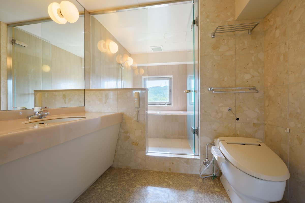 japanese western style room - south tower | bathroom | separate bathtub and shower, free toiletries, hair dryer, slippers