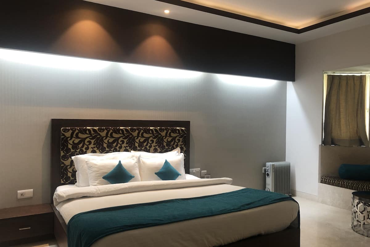 Premium bedding, desk, laptop workspace, free WiFi