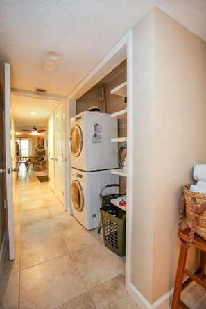Laundry area with washer and dryer, plus storage for your essentials.