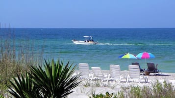 On the beach, sun-loungers, beach towels