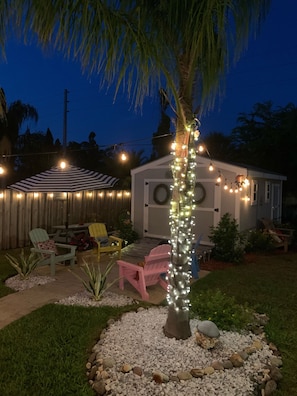 Backyard at Night - ambient lighting  - Sprawling, private pool oasis with plenty of room for R&R! Pet Friendly! (Ponte Vedra Beach)