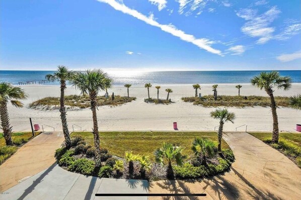 On the beach, sun loungers, beach towels