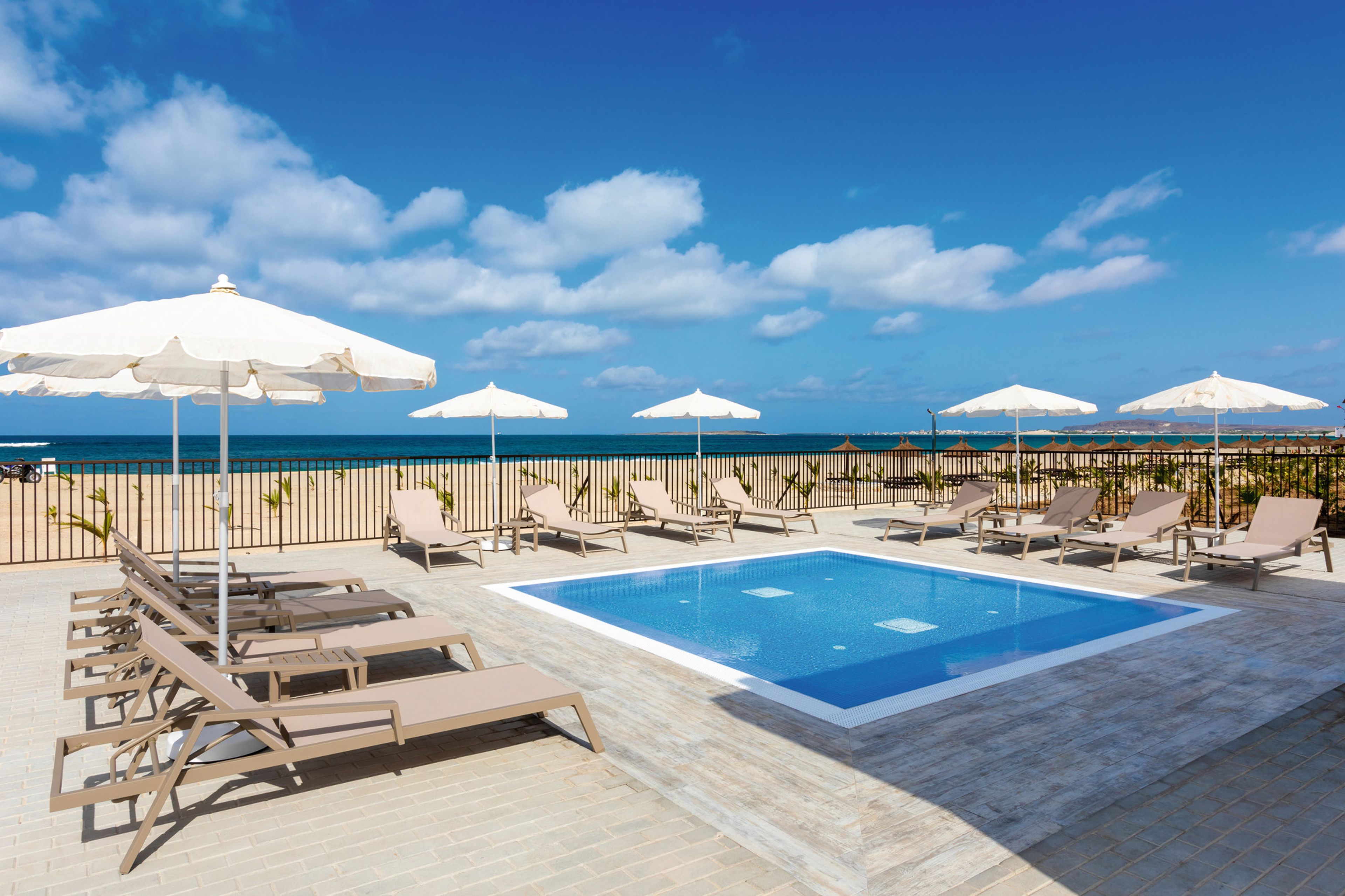 3 outdoor pools, pool umbrellas, sun loungers
