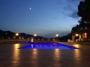 Seasonal outdoor pool, pool loungers