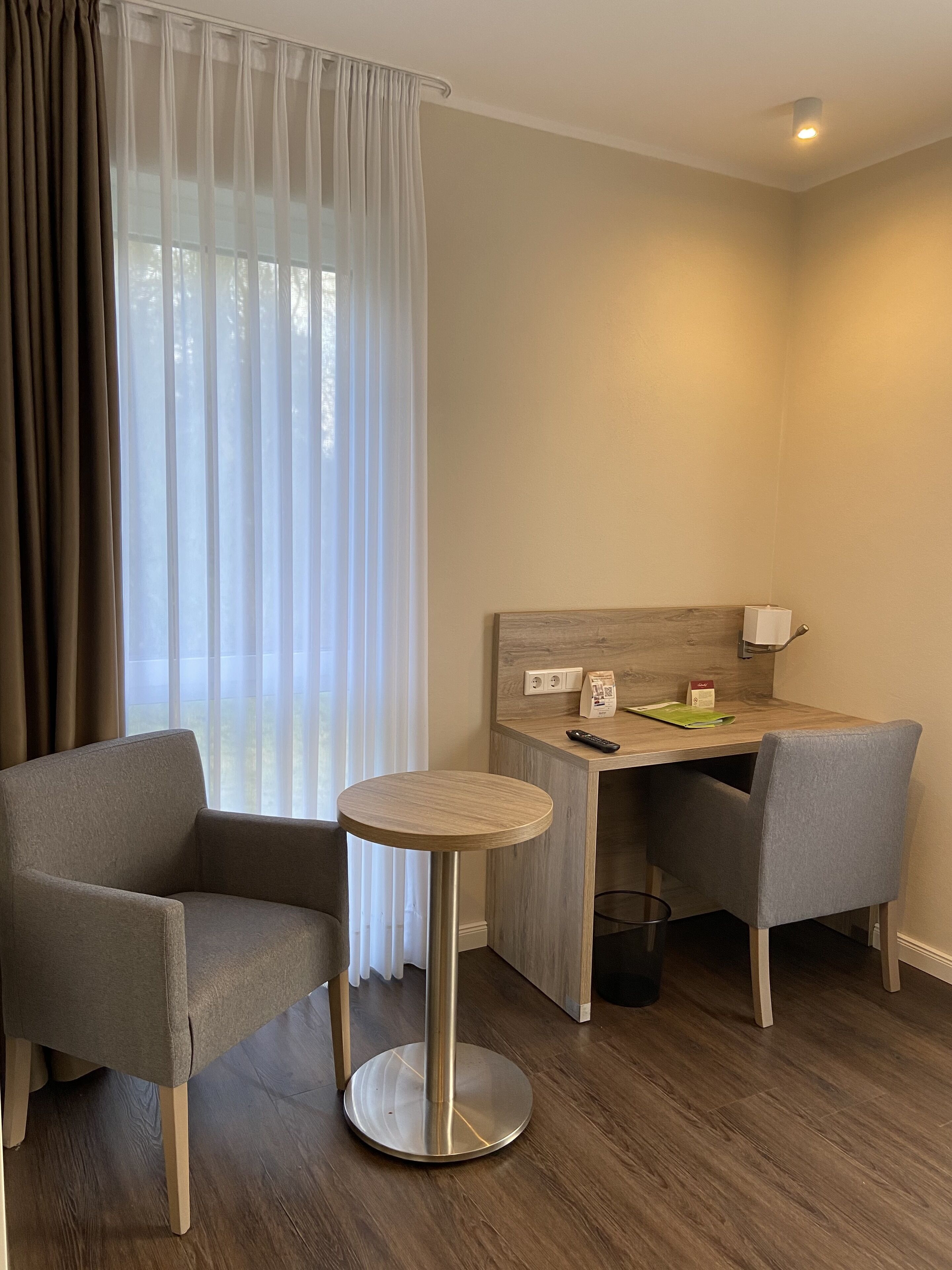 family room | premium bedding, in-room safe, desk, iron/ironing board