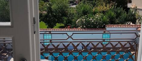 Signature Double Room, 1 Queen Bed with Sofa bed, Balcony, Pool View | Balcony