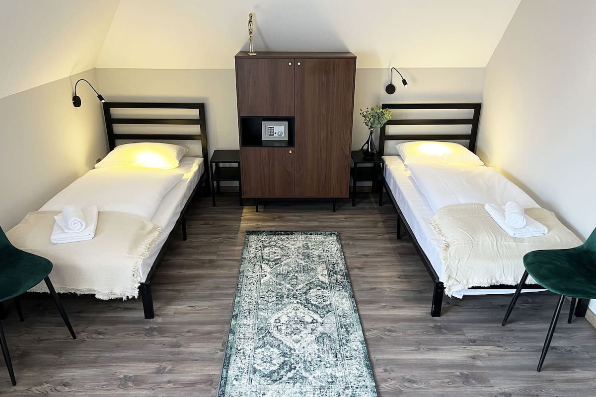 Standaard Twin kamer | 1 slaapkamer, een kluis op de kamer, verduisterende gordijnen