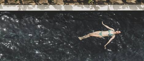 Seasonal outdoor pool, open 10:30 AM to 10:00 PM, pool umbrellas