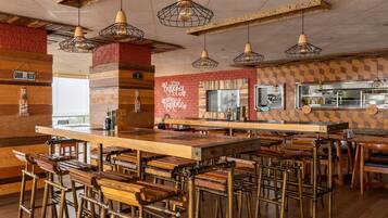 Breakfast, lunch, dinner served; local and international cuisine