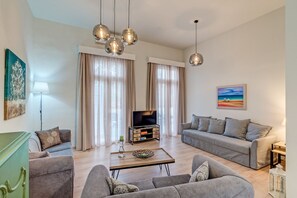 Apartamento | Zona de estar | Televisión de pantalla plana de 40 pulgadas con canales por satélite