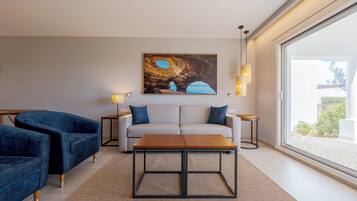 Apartment, 1 Bedroom, Balcony | Living area | Flat-screen TV
