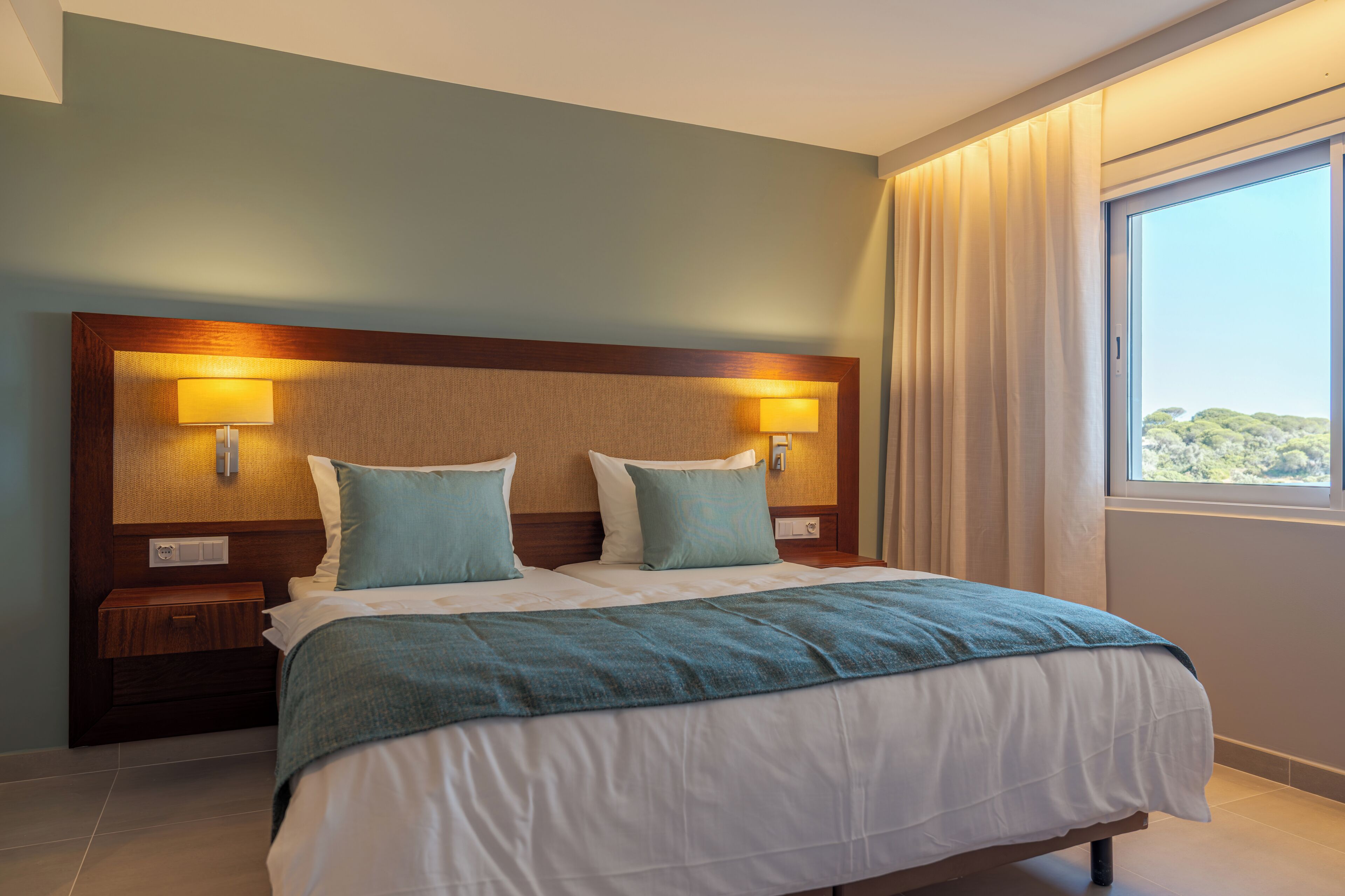 Deluxe Apartment, 1 Bedroom, Balcony, Beach View | Hypo-allergenic bedding, minibar, in-room safe, blackout drapes