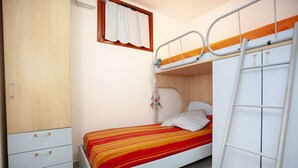 Comfort Apartment, 2 Bedrooms | 1 bedroom, iron/ironing board - SVS - Pittulongu Apartments (Olbia)