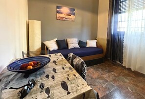 Appartement, 1 chambre | Coin séjour