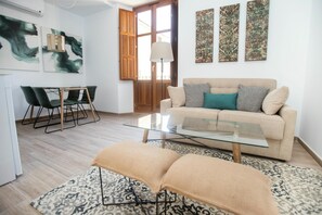 Duplex, 3 Bedrooms | Living room | 32-inch flat-screen TV with digital channels, TV - Feelathome Mártires Apartments (Málaga)