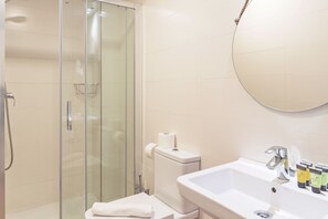 Apartment, 2 Bedrooms | Bathroom | Shower, free toiletries, hair dryer, towels