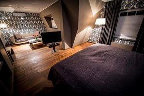Roba de llit d'alta qualitat, minibar i caixa forta a l'habitació