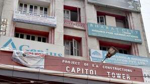 A building with multiple signs, including 'CHHABRA SPORTS AGENCIES' prominently displayed. - Hotel Maple Inn (Patna)