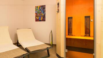 Relax in comfort with two reclining chairs and a cozy bench area.