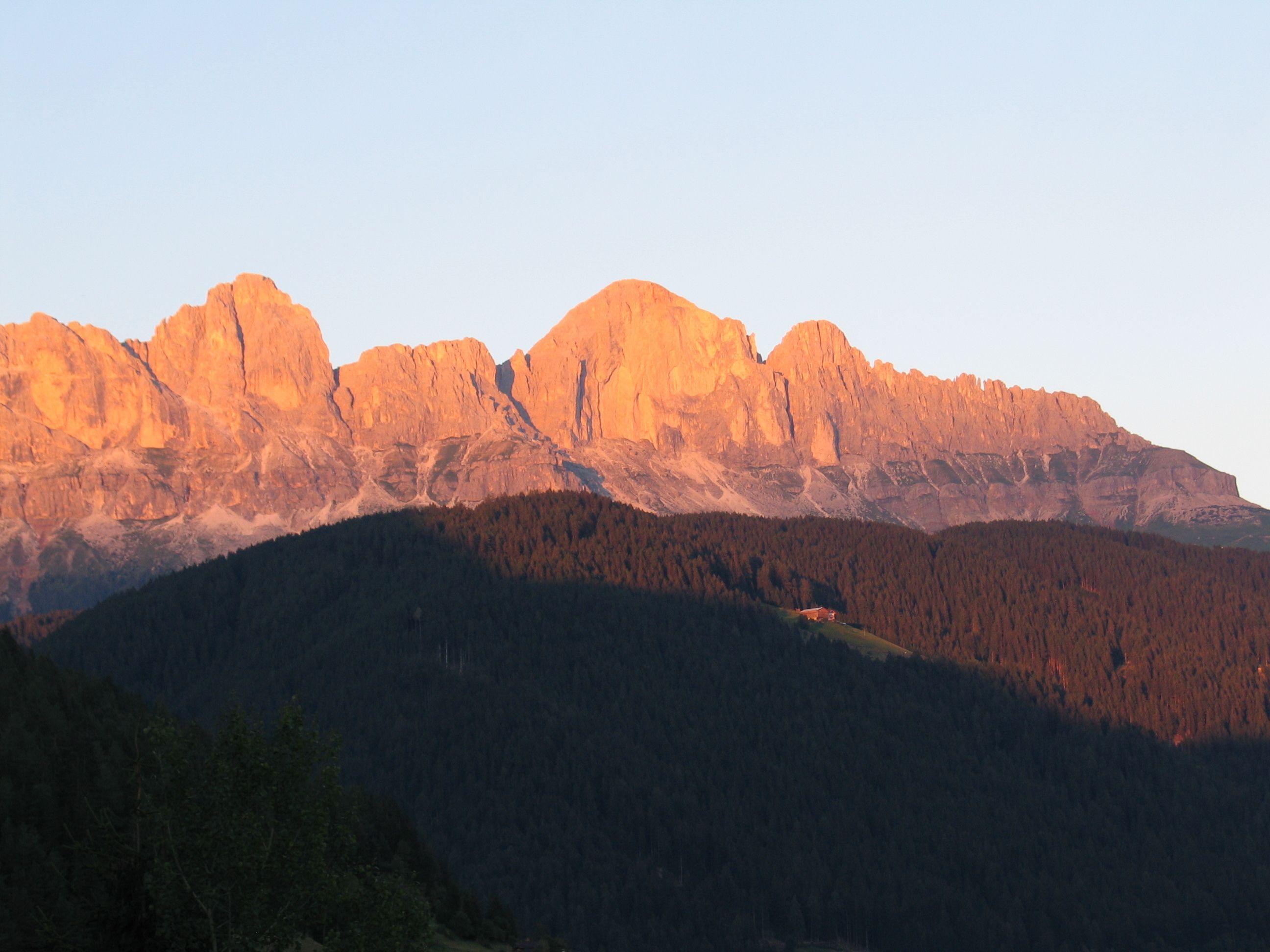 A mountain range with a forested valley.