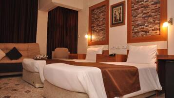 Standard Triple Room | Premium bedding, minibar, desk, laptop workspace