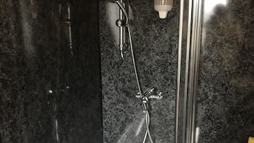 Shower, free toiletries, hair dryer, towels