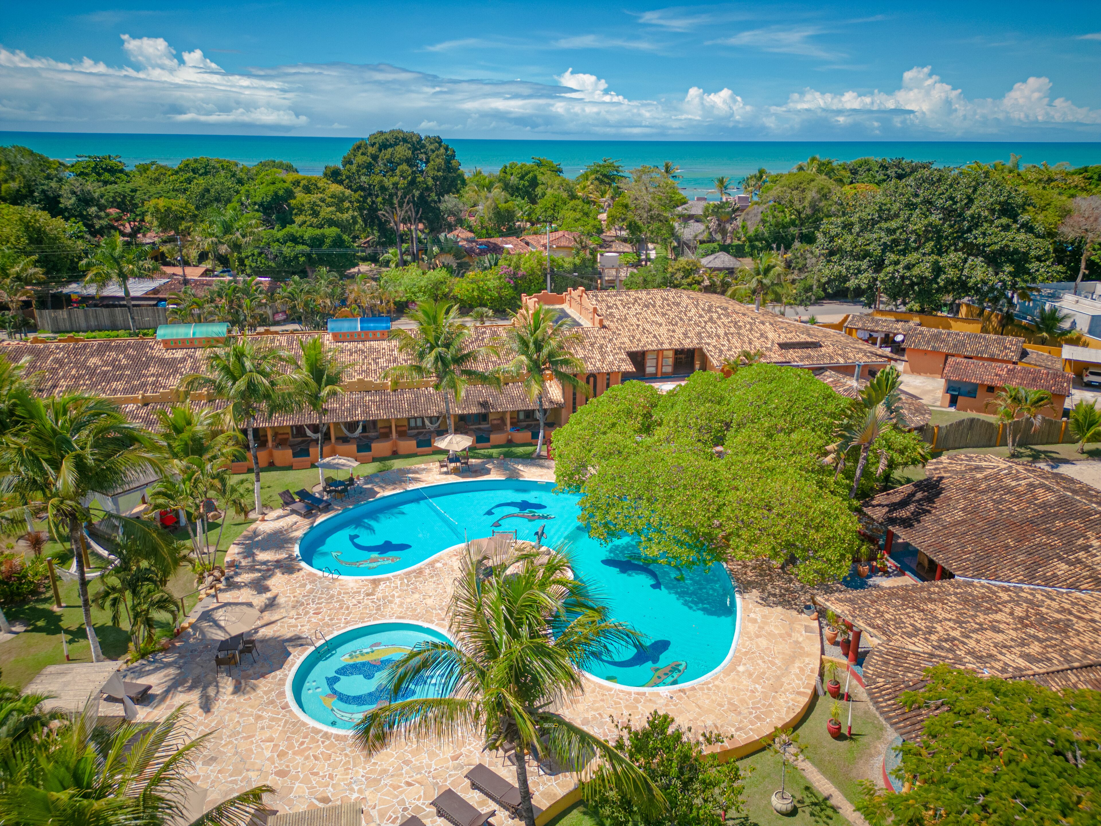 Outdoor pool, open 10:00 AM to 8:00 PM, pool umbrellas, pool loungers