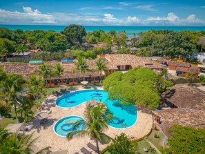 Outdoor pool, open 10:00 AM to 8:00 PM, pool umbrellas, pool loungers