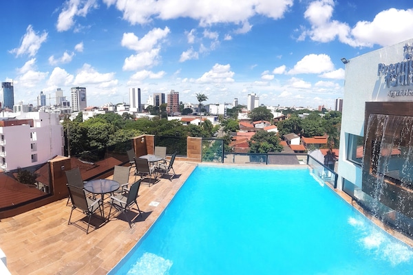 Outdoor pool, open 9:00 AM to 8:00 PM, pool loungers