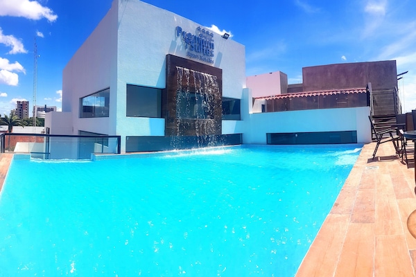 Outdoor pool, open 9:00 AM to 8:00 PM, pool loungers